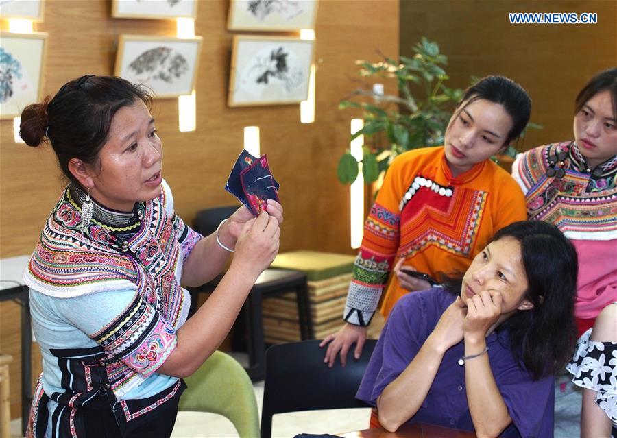 Teacher of Yi Ethnic Group Provides Embroidery Training for 